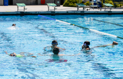 Chlidren learn swimming techniques from the lifeguards during the "World’s Largest Swim Lesson" at the Santa Clarita Aquatic Center on Thursday, June 26, 2025. Habeba Mostafa/ The Signal