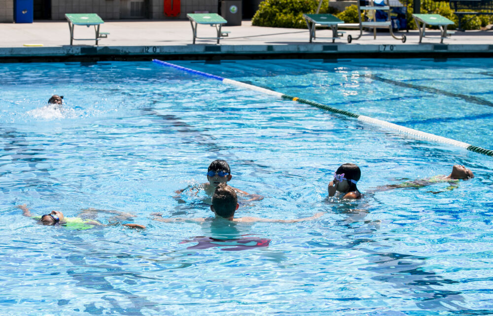 Chlidren learn swimming techniques from the lifeguards during the "World’s Largest Swim Lesson" at the Santa Clarita Aquatic Center on Thursday, June 26, 2025. Habeba Mostafa/ The Signal