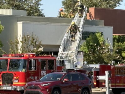 Firefighters look for signs of a fire at Starbucks on Seco Canyon Road in Saugus, July 16, 2025. Tim Whyte/The Signal