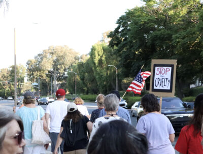 Attendees march to Valencia United Methodist Church for the Good Trouble Interfaith Vigil in Valencia, Thursday, July 17, 2025. Kamryn Martell/The Signal