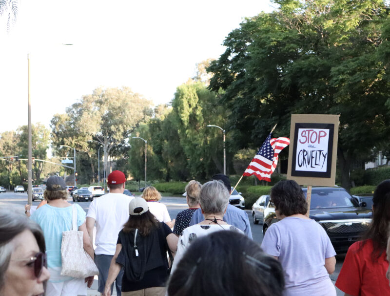 Attendees march to Valencia United Methodist Church for the Good Trouble Interfaith Vigil in Valencia, Thursday, July 17, 2025. Kamryn Martell/The Signal
