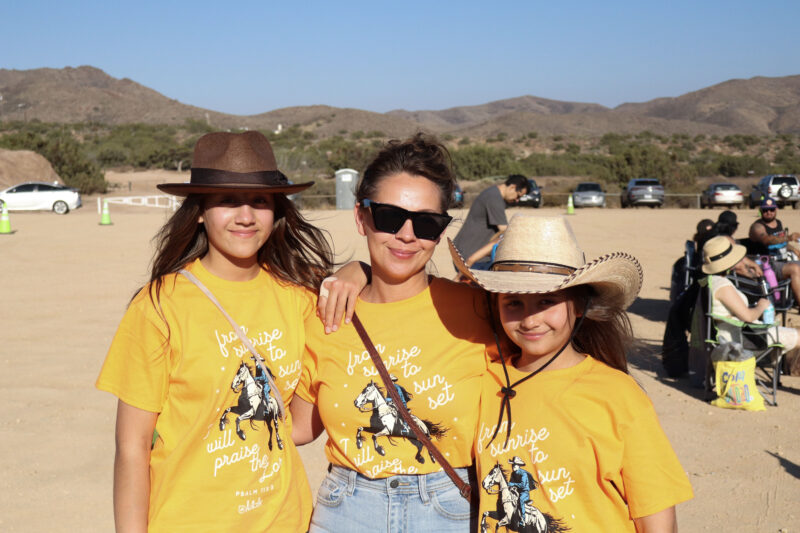 Savannah Figueroa (L), 12, Jacqueline Figueroa (M) and Gracie Figueroa (R), 10, pose for a photo at the Celebration of Western Songs at Vasquez Rocks in Agua Dulce, Sunday, July 13, 2025. Kamryn Martell/The Signal