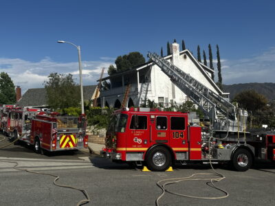 Firefighters respond to a house fire in the 16000 block of Sierra Hills Street in Canyon Country, July 18, 2025. Katherine Quezada/The Signal