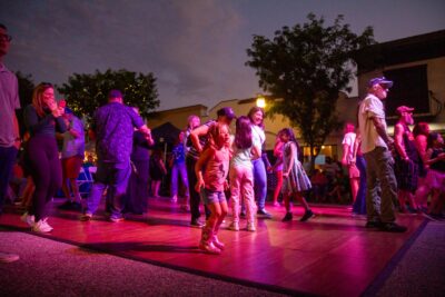 Guests dance to live music during the Senses Block Party “Fandomania” celebration on July 17, 2025 in Old Town Newhall in Santa Clarita, Calif. Katherine Quezada/The Signal
