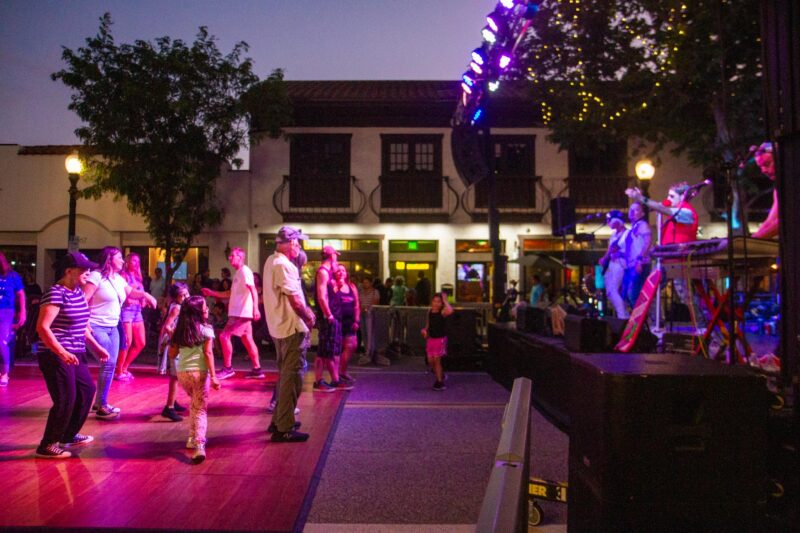 Guests dance to live music during the Senses Block Party “Fandomania” celebration on July 17, 2025 in Old Town Newhall in Santa Clarita, Calif. Katherine Quezada/The Signal