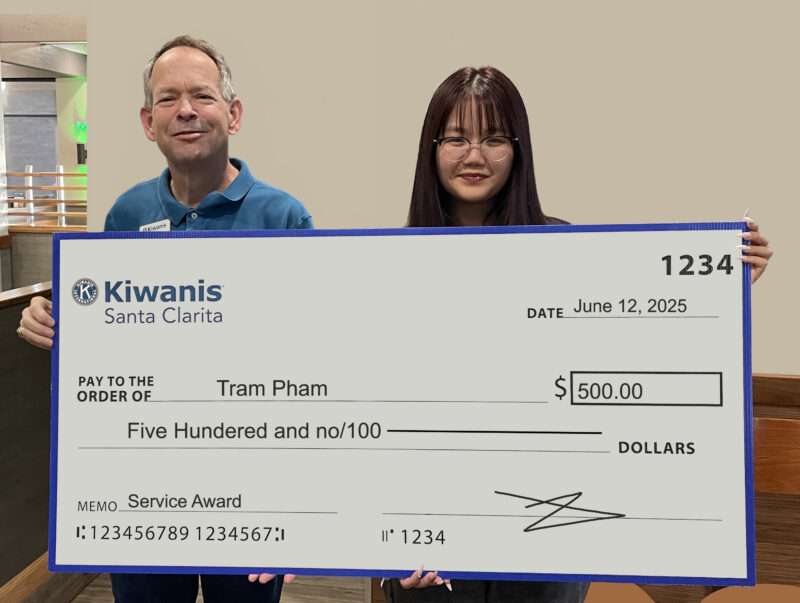 Mark E. Hartzell (left), president of the Kiwanis Club of Santa Clarita and Tram Pham, service award recipient. Courtesy photo.