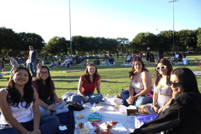 Attendees enjoy a picnic at the city of Santa Clarita City Cinemas "inside Out 2" event at Central Park in Saugus, Friday, July 25, 2025. Kamryn Martell/The Signal