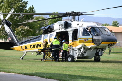 A minor is loaded into an EMS helicopter after being involved in an e-bike crash near West Creek Park in Valencia, July 26, 2025. Michael Picarella/The Signal