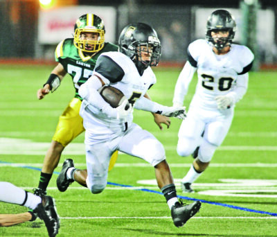 Golden Valley halfback Shane Tamura (5) runs against Canyon on 101714. Dan Watson/The Signal
