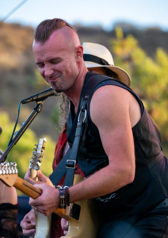Aaron Kusterer, lead guitarist for Twisted Gypsy, performs  during Concerts in the Park hosted by the city of Santa Clarita on July 26, 2025 at Central Park in Saugus, Calif. Katherine Quezada/The Signal