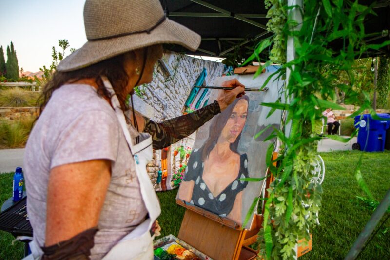 Artist Lorelle Miller createsm a live painting at the Celebrate culture series: Italy on Aug. 8, 2025 at the Canyon Country Community Center in Canyon Country, Calif. Katherine Quezada/The Signal