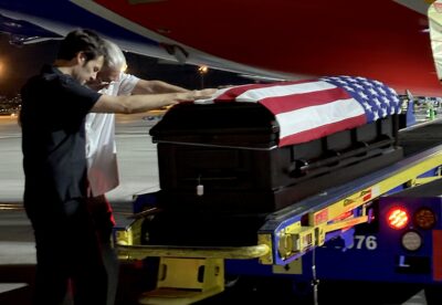 From left: Nick Huff and his father, Ron Huff, welcome the remains of Ron’s father, Edward Schnore, at Harry Reid International Airport in Las Vegas, NV, July 9, 2025. Photo courtesy of Nick Huff.