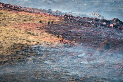 Firefighters battle the Hawk Fire on Aug. 14, 2025 in Acton, Calif. Katherine Quezada/The Signal