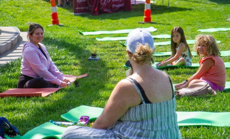 Attendees participate in a Family Yoga class during the  Youth and Family Festival hosted by Assemblywoman Pilar Schiavo’s office, D-Chatsworth in partnership with Strength United, a CSUN community agency on Aug. 16, 2025 at the Canyon Country Community Center, in Canyon Country, Calif. Katherine Quezada/The Signal