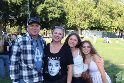 Rich Haring (L), Chrissy Haring (CL), Elena Haring (CR), 17, and Jenna Haring (R), 14, pose for a photo at the sixth installment "Always, Adele" of Concerts in the Park at Central Park in Saugus, Saturday, Aug. 16, 2025. Kamryn Martell/The Signal