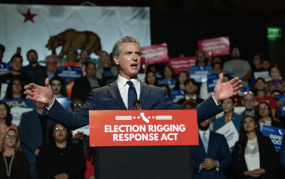 Gov. Gavin Newsom speaks during a rally about redistricting at the Democracy Center at the Japanese American National Museum in Los Angeles on Aug. 14, 2025. Photo by Ted Soqui for CalMatters