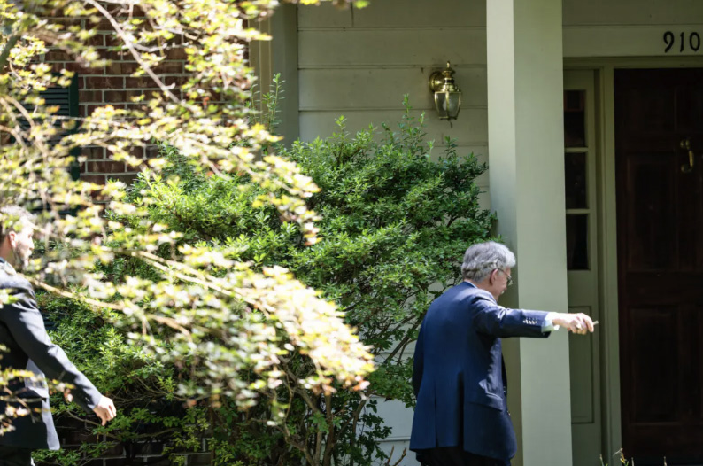 Former national security adviser John Bolton arrives at his residence after FBI raids his home in Bethesda, Md., on Aug. 22, 2025. Photo by Madalina Kilroy.