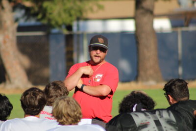 Santa Clarita Christian head coach, Austin Fry, speaking to team during practice. Ryan Romero/The Signal