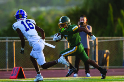 Charter Oak cornerback Jontae Beckwith (16) runs to tackle Canyon running back Semaj Richardson (1) during his attempt to run the ball during Friday’s game, Aug. 22, 2025 at Canyon High. Katherine Quezada/The Signal