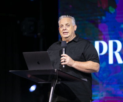 David Cox, USA Director for ZOE International, speaks to the crowd during the ZOE International Human Trafficking Forum at Elevate Church on Wednesday, Aug. 20, 2025. Habeba Mostafa/ The Signal