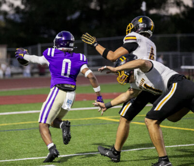 Valencia wide receiver Elias Holloway (0) scores the first touchdown of the game against Simi Valley during the first quarter of Friday’s game at Valencia High School on Aug. 22, 2025. Habeba Mostafa/ The Signal