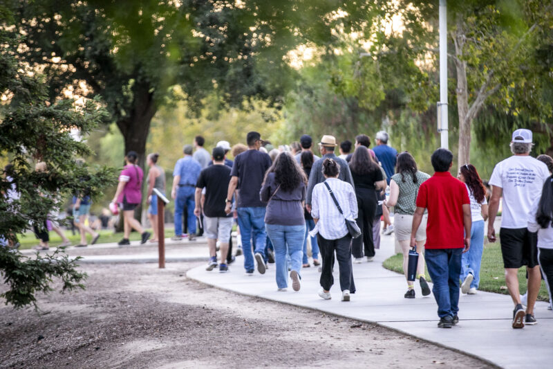 Families, dignitaries and supporters walk to honor the 123 youth who were killed in traffic-related incidents in Santa Clarita throughout the years during the Evening of Remembrance at Central Park on Wednesday, Aug. 27, 2025. Habeba Mostafa/ The Signal