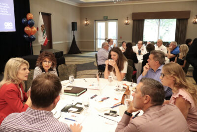 Attendees speak in a discussion at the Valley Industry Association's CEO Forum at the Hyatt Regency Valencia in Valencia, Friday, Aug. 22, 2025. Kamryn Martell/The Signal