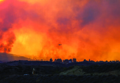 Thousands of community members were ordered to evacuate on Thursday, August 7 as firefighters battled the “Canyon Fire.” PHOTO BY HABEBA MOSTAFA / THE SIGNAL