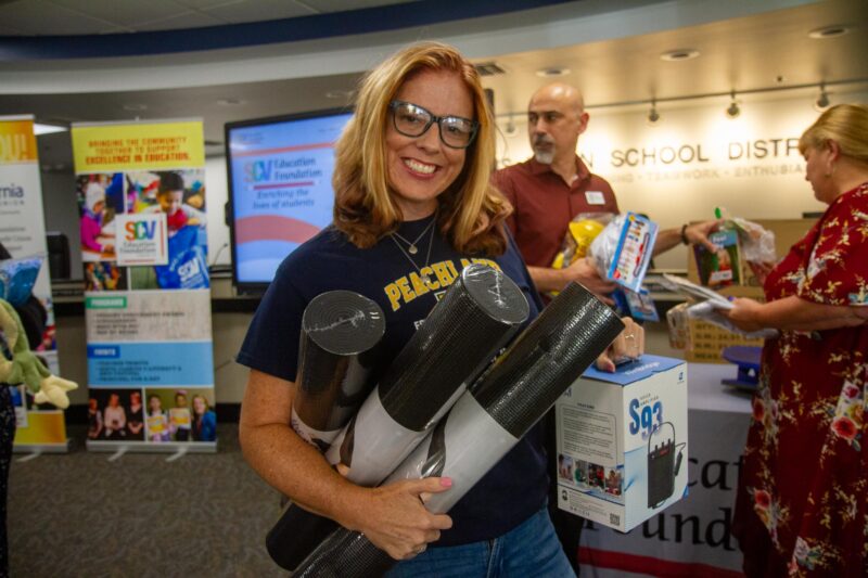 Peachland Elementary School teacher Ashlee Richardi with her yoga mats awarded by the SCV Education Foundation on Aug. 29, 2025. Katherine Quezada/The Signal