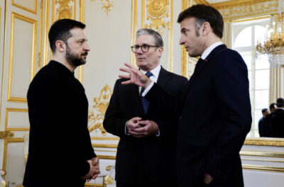 Ukrainian President Volodymyr Zelenskyy, (L), French President Emmanuel Macron, (R), and British Prime Minister Keir Starmer (C) speak during a meeting at the Elysee Palace, in Paris on March 27, 2025. Ludovic Marin, Pool Photo via AP