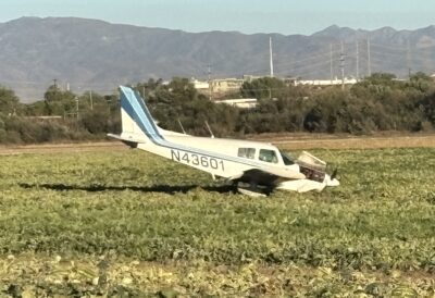 An airplane sits in a field after crash-landing there off The Old Road near Henry Mayo Drive, behind Magic Mountain in Valencia, Sept. 7, 2025. Michael Picarella/The Signal