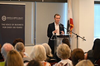 Rep. George Whitesides, D-Agua Dulce, speaks on matters in his district during a congressional forum hosted by the Santa Clarita Valley Chamber of Commerce at College of the Canyons in Valencia, Aug. 29, 2025. Michael Picarella/The Signal