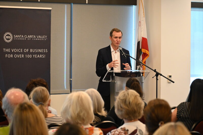 Rep. George Whitesides, D-Agua Dulce, speaks on matters in his district during a congressional forum hosted by the Santa Clarita Valley Chamber of Commerce at College of the Canyons in Valencia, Aug. 29, 2025. Michael Picarella/The Signal