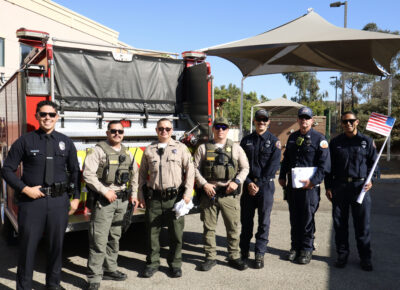 First responders from the Santa Clarita Valley Sheriff's Station and Fire Station 143 pose for a photo at the "SCVi First Responders" assembly at SCVi in Castaic, Thursday, Sept. 11, 2025. Kamryn Martell/The Signal