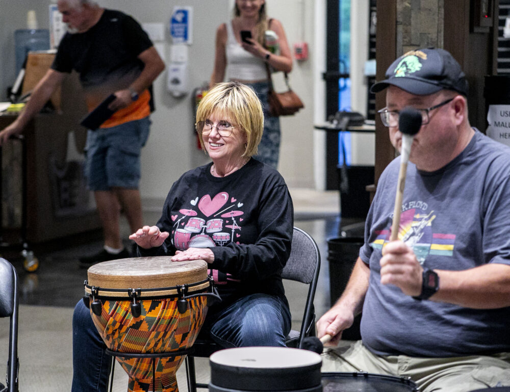 Robin Blate participates in the Tuesday night community drum circle at Remo Music Center in Castaic on Sept. 2, 2025. Habeba Mostafa/ The Signal