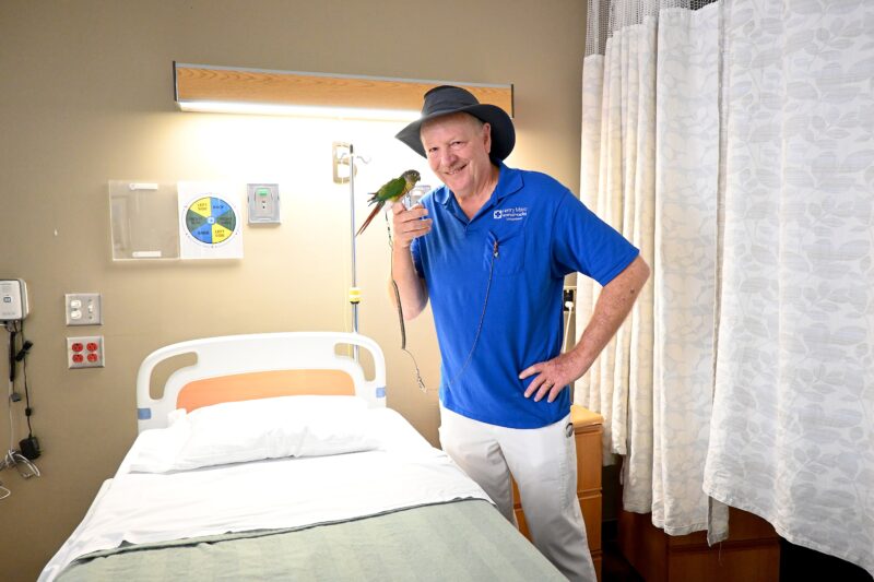Portrait of Charles Davis and his therapy bird, Glory, at Henry Mayo Newhall Hospital in Valencia, Sept. 5, 2025. Michael Picarella/The Signal
