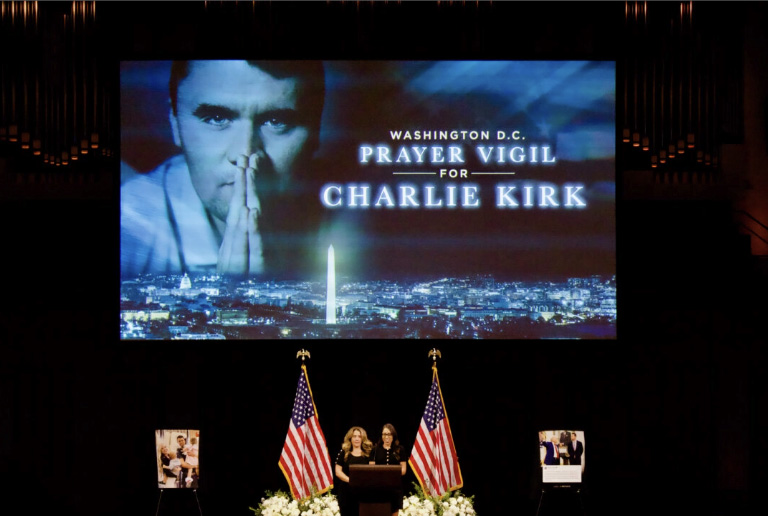Charlotte Perez and Malia Shirley, Turning Points USA officials, deliver opening remarks at a prayer vigil for Charlie Kirk at the John F. Kennedy Center in Washington on Sept. 14, 2025. Photo by Travis Gillmore.