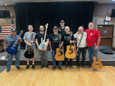 Front row: Elks member Vince Morales, Guitars for Vets members David Russell, Chris Morse, Tom Lamog, Bruce Geiger, Mike Singletary and Elks member Wayne Edwards. Back row: Elks member Charlie Handy. Courtesy photo.
