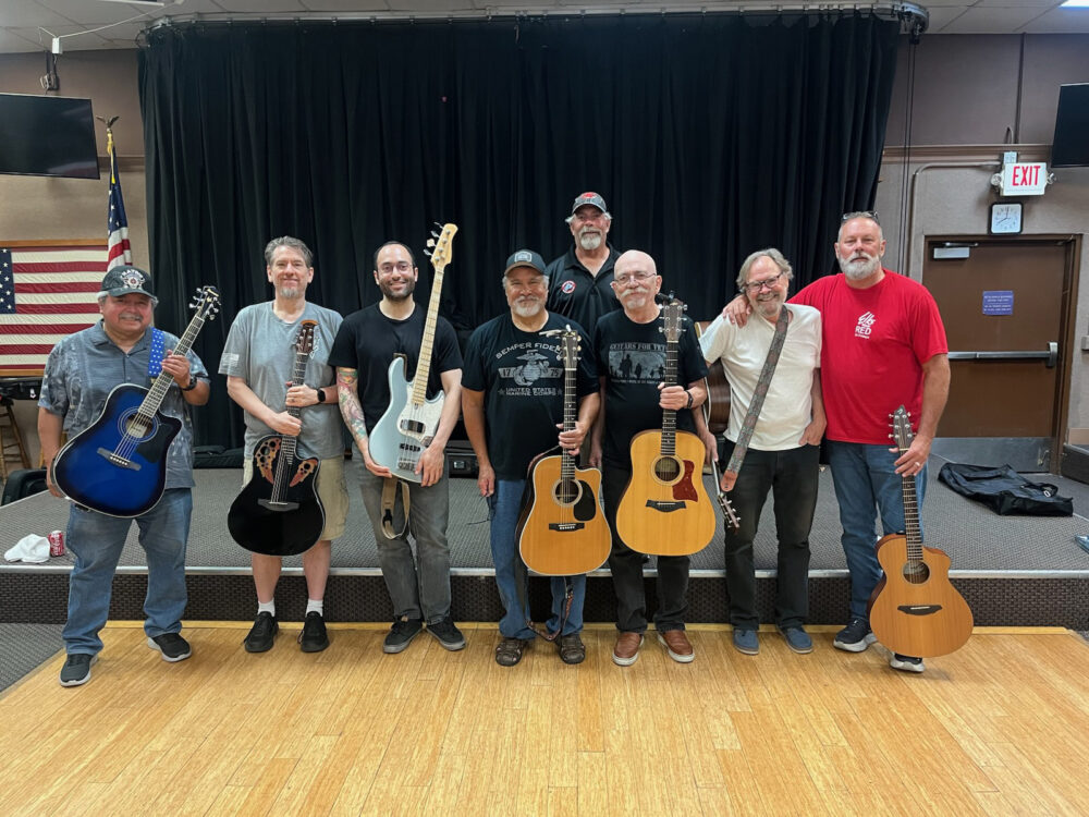 Front row: Elks member Vince Morales, Guitars for Vets members David Russell, Chris Morse, Tom Lamog, Bruce Geiger, Mike Singletary and Elks member Wayne Edwards. Back row: Elks member Charlie Handy. Courtesy photo.
