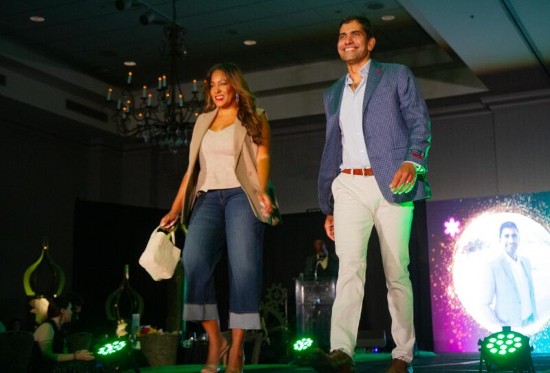 Di Thompson and Ajay Joshi for the  14th annual Fashion show hosted by Soroptimist of Greater Santa Clarita Valley at the Hyatt on Sept. 13, 2025. Katherine Quezada/The Signal