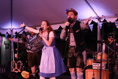Die Sauerkrauts try to get the audience to clap during their peformance at the "Oktoberfest" Senses Block Party in Newhall, Calif., Thursday, Sept. 18, 2025. Kamryn Martell/The Signal