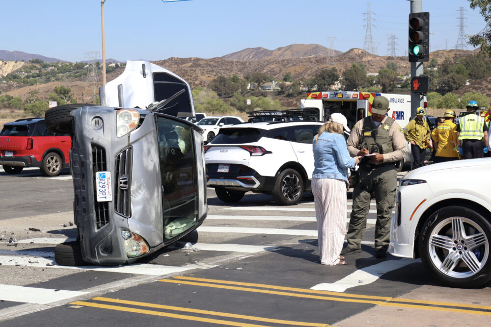 One car was turned on its side after a traffic collision on Avenida Rancho Tesoro and west Copper Hill Drive in Valencia on Monday, Sept. 22, 2025. Kamryn Martell/The Signal