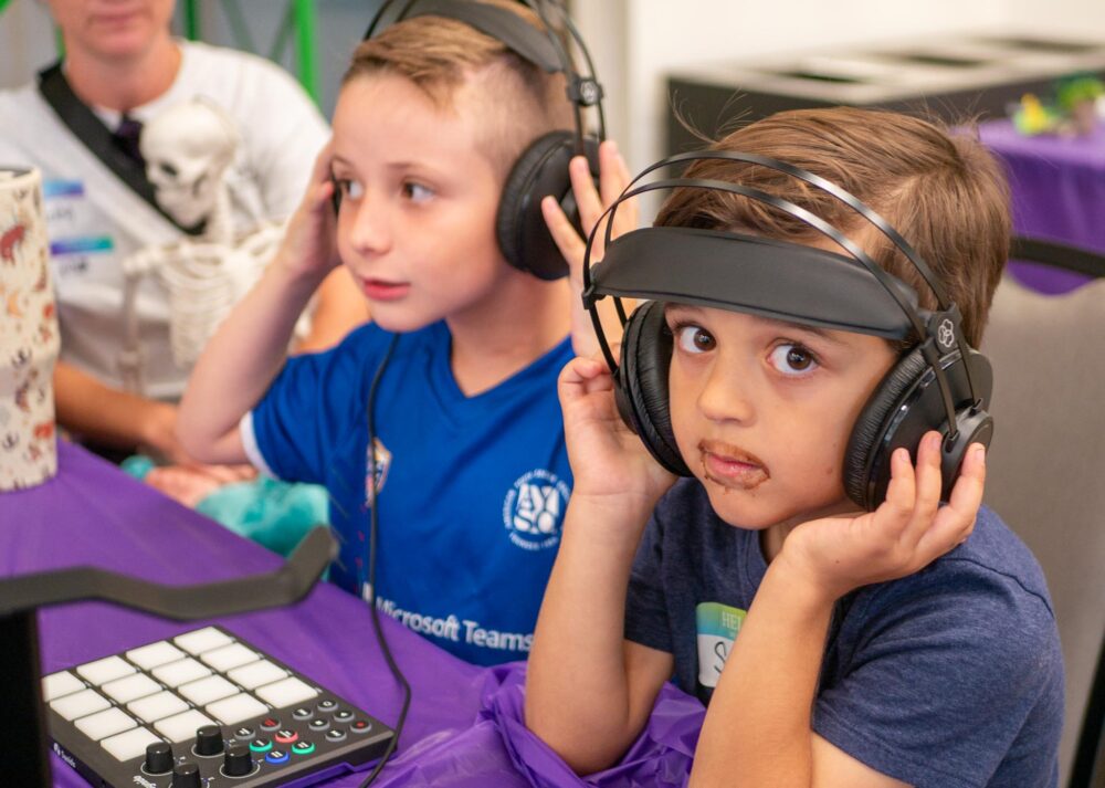 Sage, 6, (front) and Cohen Gampe, 10, pariticpate in playing with sounds during the Here4Fun Day event hosted by Multivium at the Canyon Country Community Center on Sept. 20, 2025. Katherine Quezada/The Signal