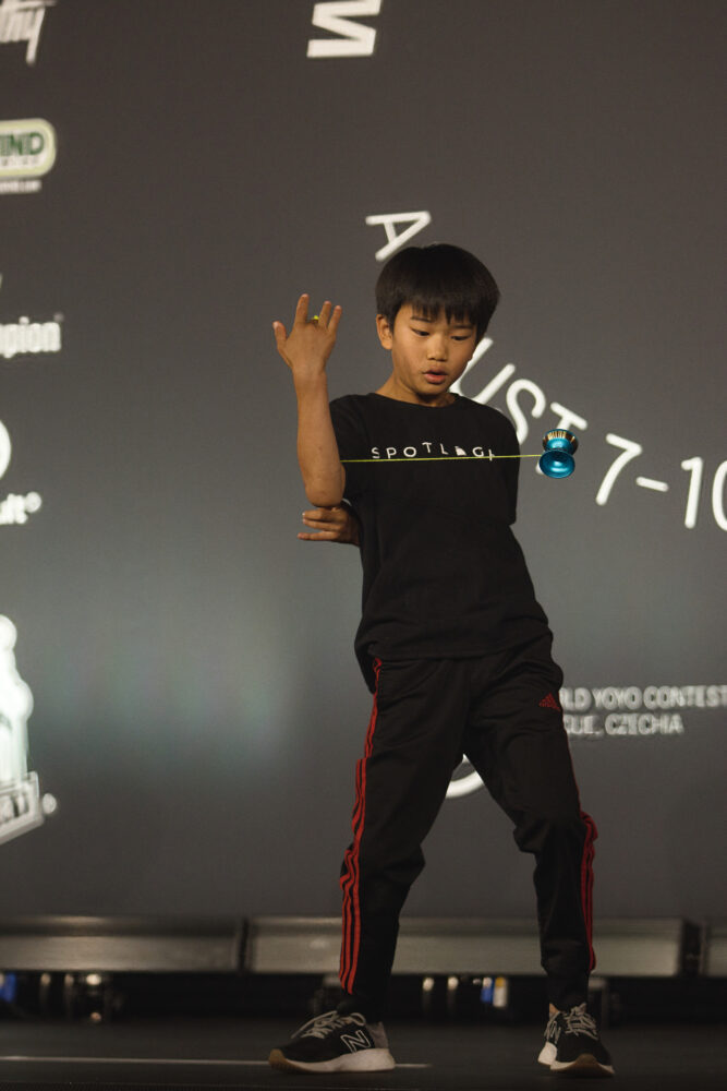 Ten‑year‑old Geo Gan, a Santa Clarita Valley resident, executes his bronze-medal performance in the inaugural Junior (U16) division at the World Yo‑Yo Contest 2025 in Prague. Photo courtesy of Dan Dauer.