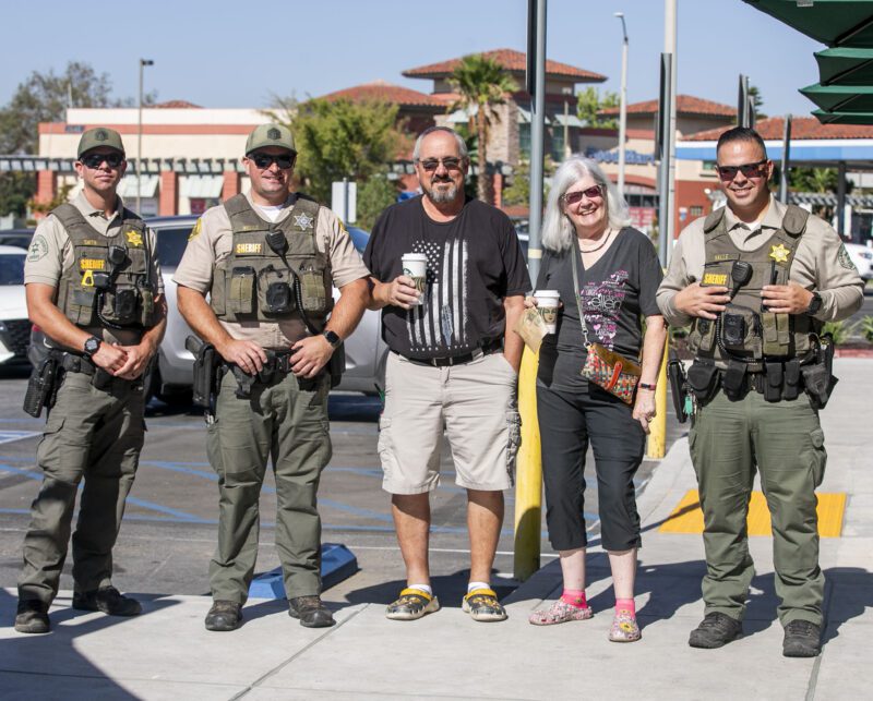 From left: Deputy Daniel Smith, Deputy Keith Wells, Michael and Katherine Angulo, and Deputy Luis Valle enjoy having discussions during Coffee with a Cop at Starbucks on Wednesday, Oct. 1, 2025. Habeba Mostafa/ The Signal