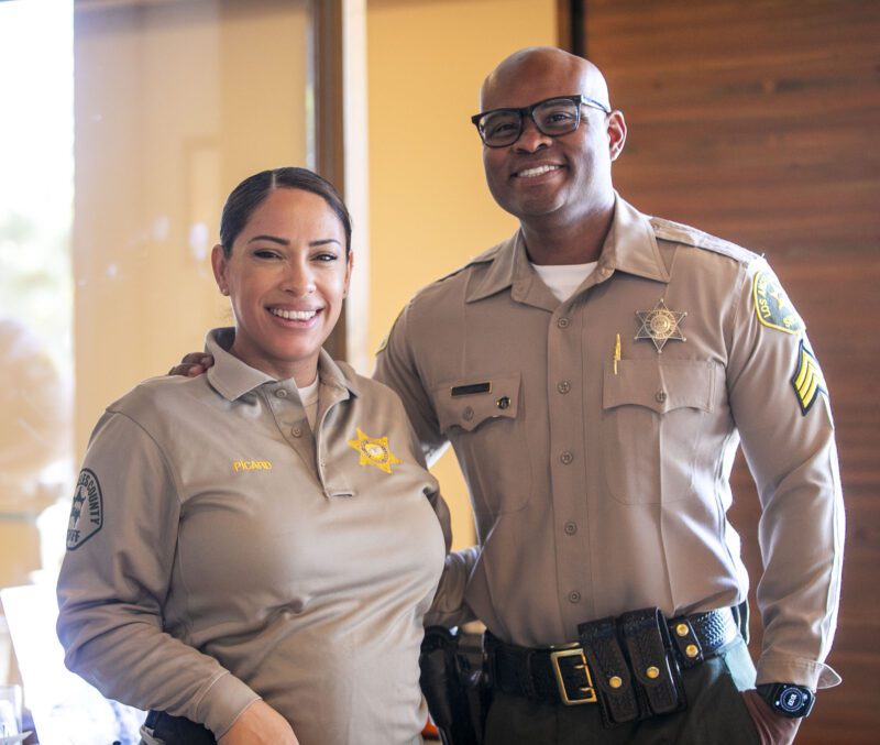 Santa Clarita Valley Sheriff's Station Public Information Officer Mariela Picard and Sgt. Johnny Gillespie enjoy speaking with and meeting residents during Coffee with a Cop at Starbucks on Wednesday, Oct. 1, 2025. Habeba Mostafa/ The Signal