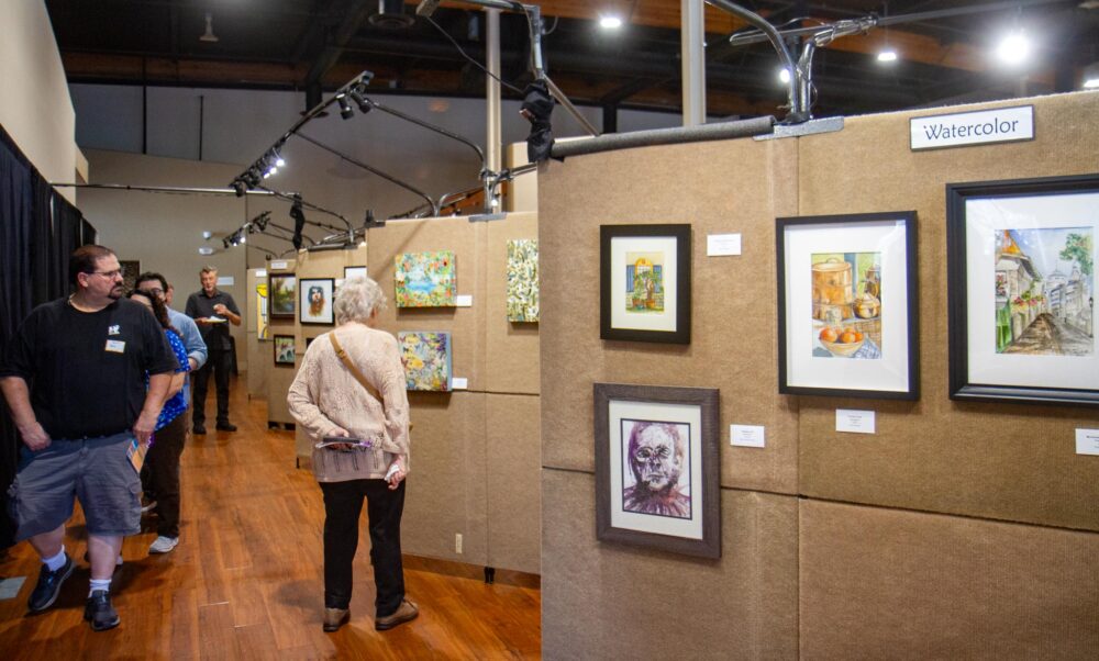 Guests walk through an assortment of art works created by members of the Santa Clarita Artists Association during the 35th annual Art Classic on Sept. 27, 2025 at The Centre. Katherine Quezada/The Signal