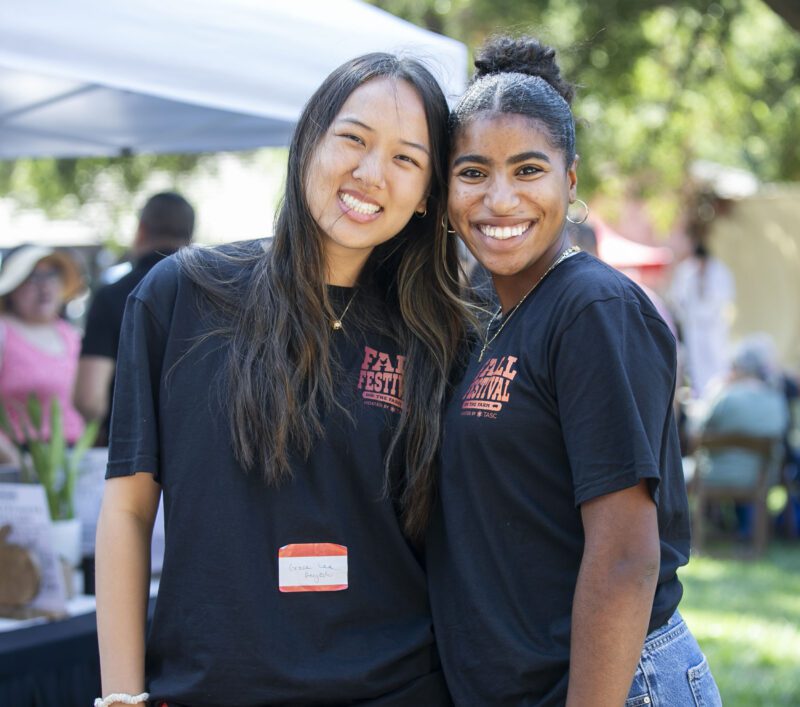 Volunteers Grace Lee Delgado, left, and Julie Acosta help with tasks during TASC's Fall Festival on the Farm in Sand Canyon on Saturday, Sept. 27, 2025. Habeba Mostafa/ The Signal