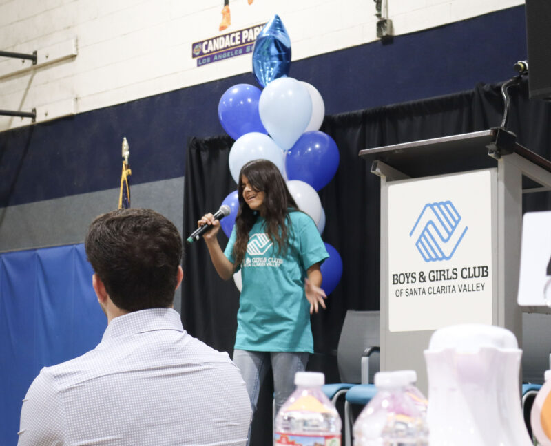 Mallory Repreza, 11, sings to the audience at the 2025 Great Futures Breakfast at the Boys & Girls Club of Santa Clarita Valley in Newhall, Calif., Wednesday, Oct. 1, 2025. Kamryn Martell/The Signal