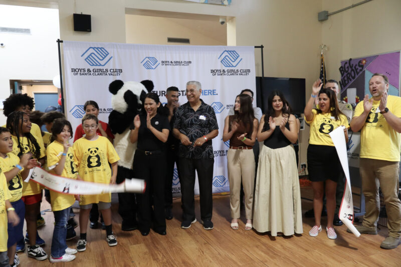 Local dignitaries, Panda Express members, Santa Clarita Valley Boys & Girls Club members and staff participate in the ribbon cutting during the Panda Cares Foundation Center of Hope ceremony at the Santa Clarita Valley Boys & Girls Club - James T. Ventress Clubhouse in Newhall, Wednesday, Sept. 24, 2025. Kamryn Martell/The Signal